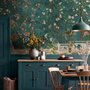 Floral wallpaper with birds in a teal chinoiserie garden with blossoms, pheasant, palms and stone railings