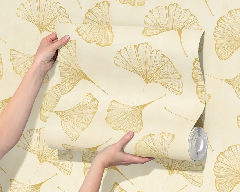 Ginkgo leaf wallpaper with ochre-gold linework on warm ivory and cream parchment ground
