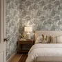 Monochrome wallpaper with grey tree toile on a clean white ground