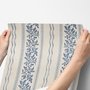 Blue wallpaper with indigo botanical stripework, pinstripes and dotted borders on warm cream parchment