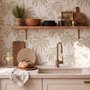 Muted sandy taupe palm trees and pale foliage on a creamy ivory ground tropical wallpaper