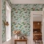 Chinoiserie wallpaper with peach birds, orchids and peonies on a pale duck egg blue ground