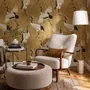 Japanese crane wallpaper with white, black and red cranes in flight on an antique-gold textured ground