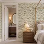Watercolor fish wallpaper with grey-blue fish, seafoam seaweed, starfish and bubbles on warm cream
