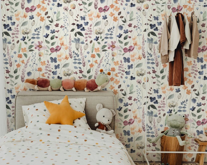 Watercolour floral wallpaper repeat with navy, blue, blush and peach wildflowers on warm cream