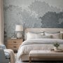 Light gray wallpaper mural with misty forest trees, falling leaves and birds