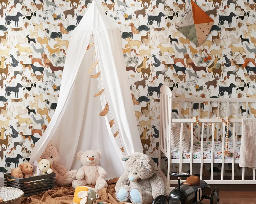 Zoomie kids wallpaper with painted dog breeds in tan, brown, black and grey on white