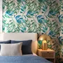 Dark olive green wallpaper with teal and cobalt watercolour lance leaves on a white ground