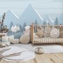 Papier peint panoramique ours blanc patineur sur la forêt enneigée d'hiver