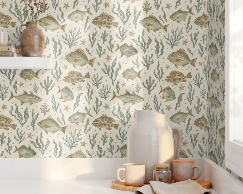 Watercolour fish wallpaper with sage seaweed, coral and starfish on a warm cream background