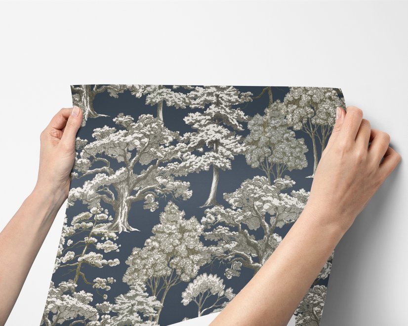 Navy wallpaper with warm ivory and taupe grey toile tree repeat on deep slate blue ground