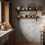 Black outline botanical wallpaper with charcoal wildflowers and grasses on a warm ivory cream ground