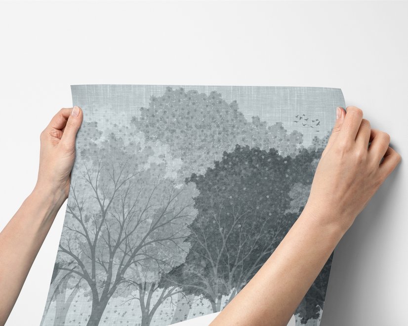Light gray wallpaper mural with misty forest trees, falling leaves and birds