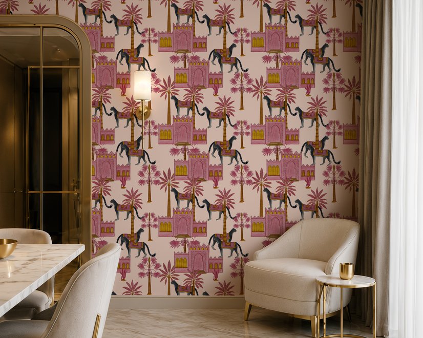 Tropical foliage wallpaper with black panthers, pink palace facades and ochre palms on pale peach