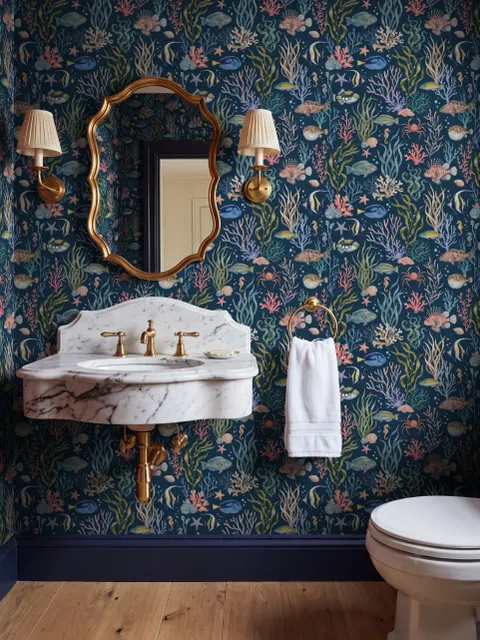 Aquarium fish tank wallpaper repeat with tropical fish, coral, seaweed, shells and bubbles on deep navy blue