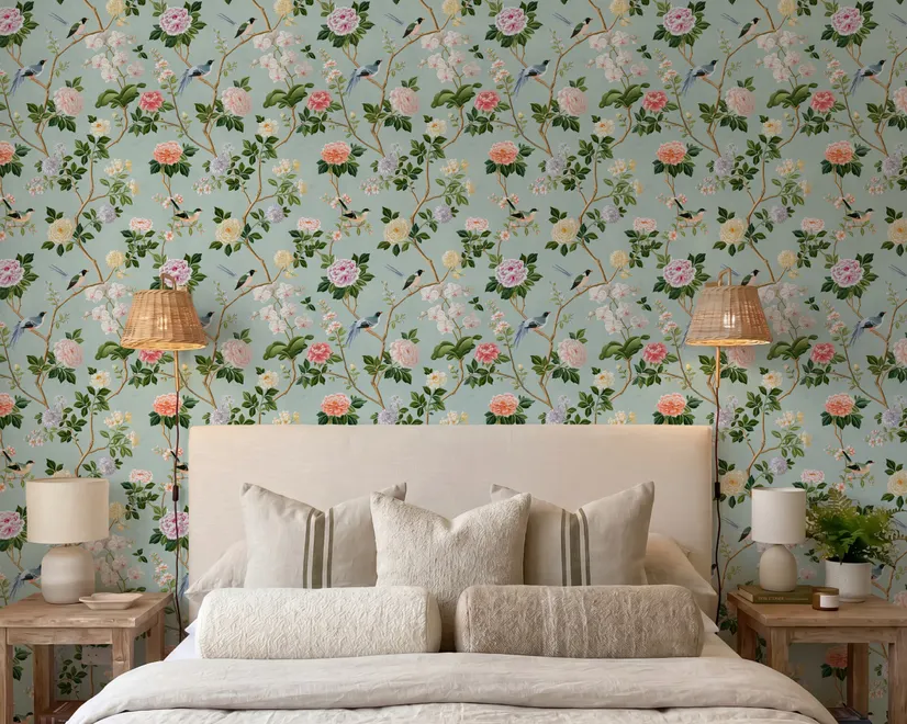 Chinoiserie wallpaper with peach birds, orchids and peonies on a pale duck egg blue ground