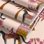 Tropical foliage wallpaper with black panthers, pink palace facades and ochre palms on pale peach