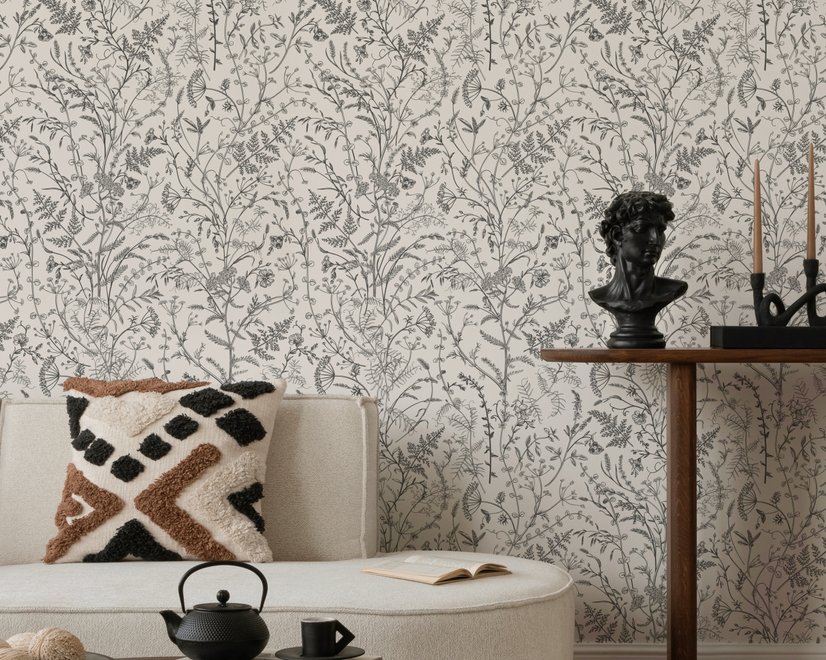 Black outline botanical wallpaper with charcoal wildflowers and grasses on a warm ivory cream ground
