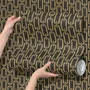 Black wallpaper with gold vertical chain link Art Deco repeat on a textured charcoal ground