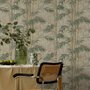 Vintage bamboo wallpaper with sage and smoky blue-green leaves on a warm taupe ground