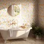 Spring floral wallpaper with pastel watercolour flowers and sage leaves on a clean white ground