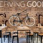 Papier peint panoramique vélo art mural briques