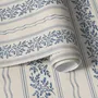Blue wallpaper with indigo botanical stripework, pinstripes and dotted borders on warm cream parchment