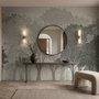 Light gray wallpaper mural with layered ink-wash woodland trees, falling leaves and birds