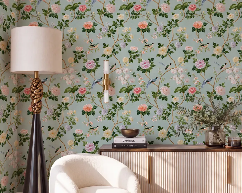 Chinoiserie wallpaper with peach birds, orchids and peonies on a pale duck egg blue ground