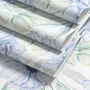 Blue floral wallpaper with watercolour anemone blooms, mint sage leaves and yellow ochre centres on white
