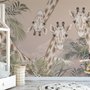 Niedliche Giraffen zwischen tropischen Blättern Fototapete