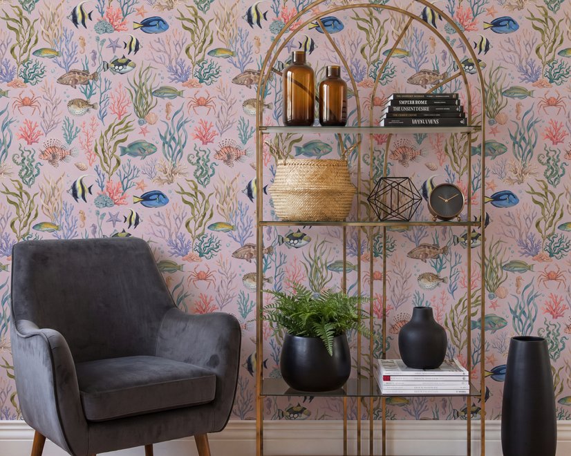 Cute pink seashell wallpaper with watercolour reef fish, coral, seaweed, starfish and shells on blush pink