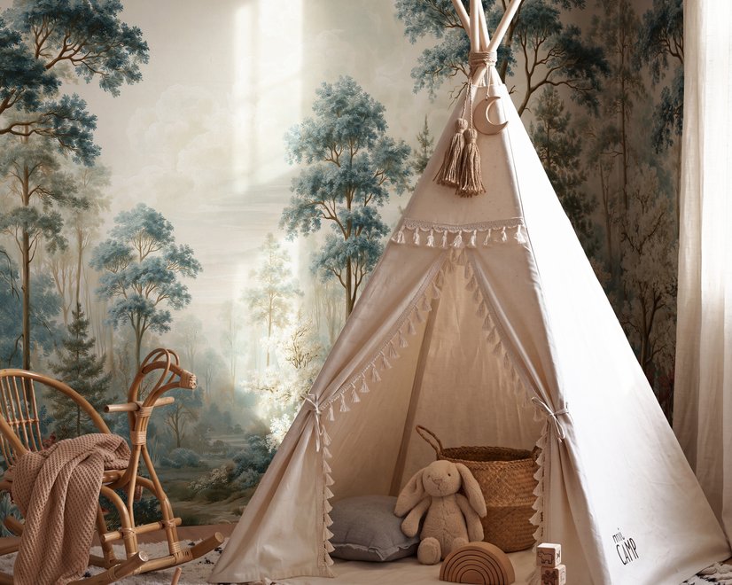 Vintage forest wallpaper mural with blue-grey trees, ivory blossom, red plants and toadstools around a misty path