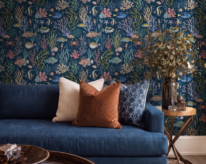 Aquarium fish tank wallpaper repeat with tropical fish, coral, seaweed, shells and bubbles on deep navy blue