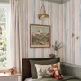 Blue and light blue wallpaper with hand-painted vertical watercolour stripes on a clean white ground