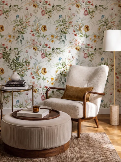 Watercolour floral wallpaper with sage leaves, blush and ochre flowers on a white ground