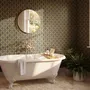 Black wallpaper with gold vertical chain link Art Deco repeat on a textured charcoal ground