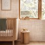 Soft brown wallpaper with pale beige gingham checks on a warm cream off-white ground