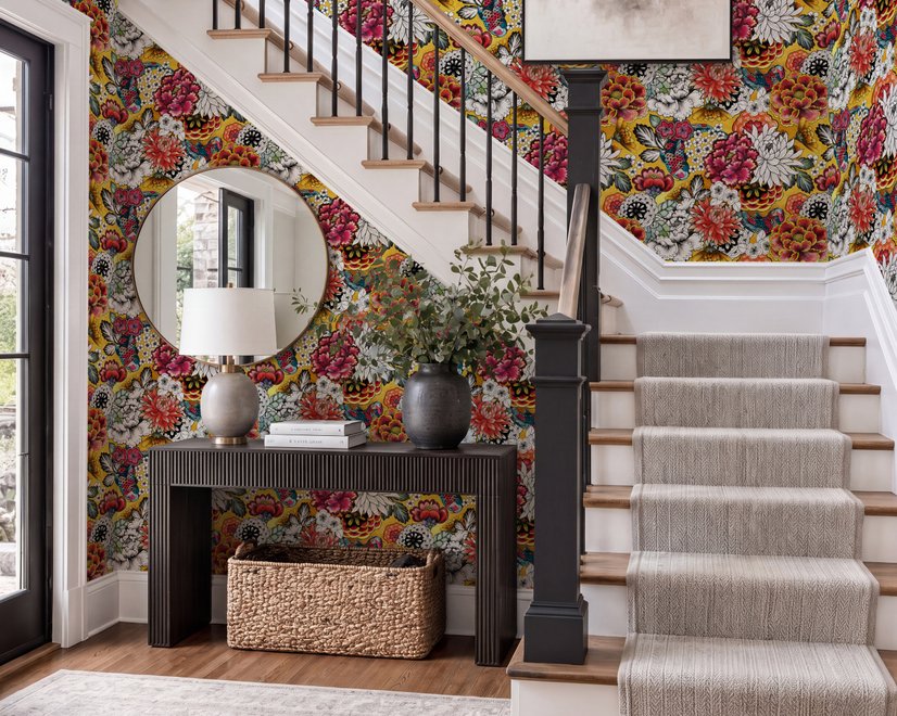 Floral and fish wallpaper with coral blooms, teal fish and black white flowers on metallic mustard-gold ground