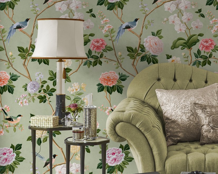 Celadon-sage chinoiserie wallpaper with blue-grey birds, tan branches, pink peonies and white orchids