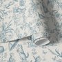 Cute cats wallpaper with dusty blue toile kittens, roses and garden scenes on warm cream