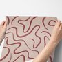 Burgundy-red looping contour lines on blush cream pink wallpaper mural