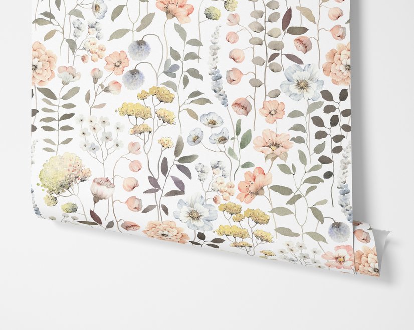 Watercolour wildflower wallpaper with pastel flowers and sage leaves on a white ground