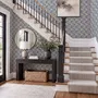 Cream colored wallpaper with denim blue geometric totem stripe repeat on a linen texture ground