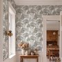Monochrome wallpaper with grey tree toile on a clean white ground