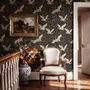 Ivory cranes and antique gold lotus flowers on charcoal-black Japanese lotus wallpaper