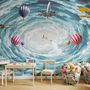 Papier peint panoramique montgolfières et avions dans le ciel