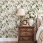 Vintage nature wallpaper with pale monkeys, sage grape leaves, white grape clusters and taupe vines on ivory.