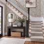 Black outline botanical wallpaper with charcoal wildflowers and grasses on a warm ivory cream ground