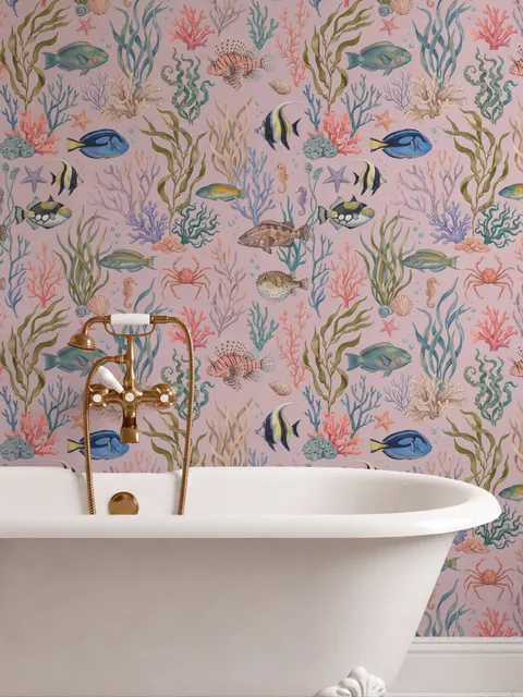 Cute pink seashell wallpaper with watercolour reef fish, coral, seaweed, starfish and shells on blush pink